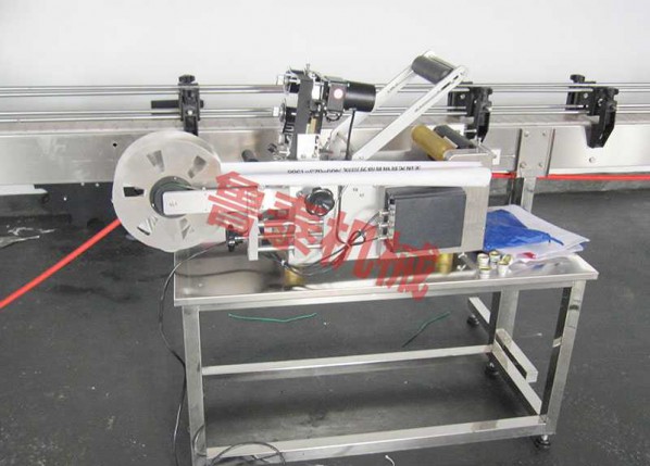 semi-automatic round bottle self-adhesive labeller