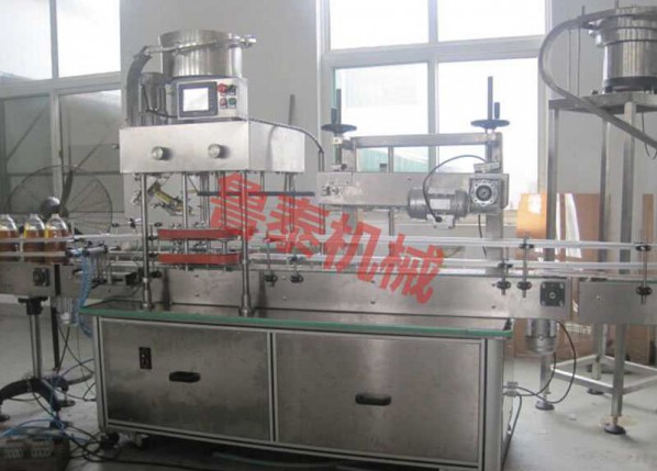 Automatic capper for oil drum